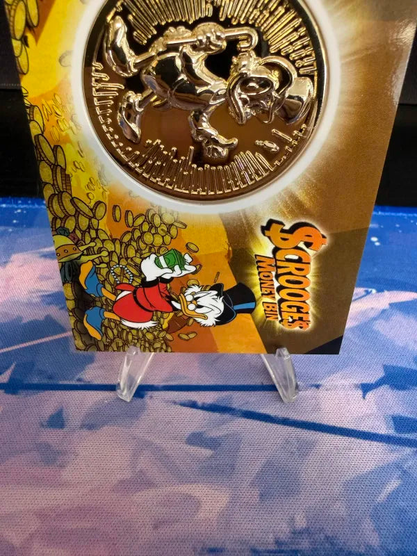 TOPPS NEON SCROOGE'S MONEY BIN METALLIC COIN CARD (Topps Neon 2026) NEAR MINT