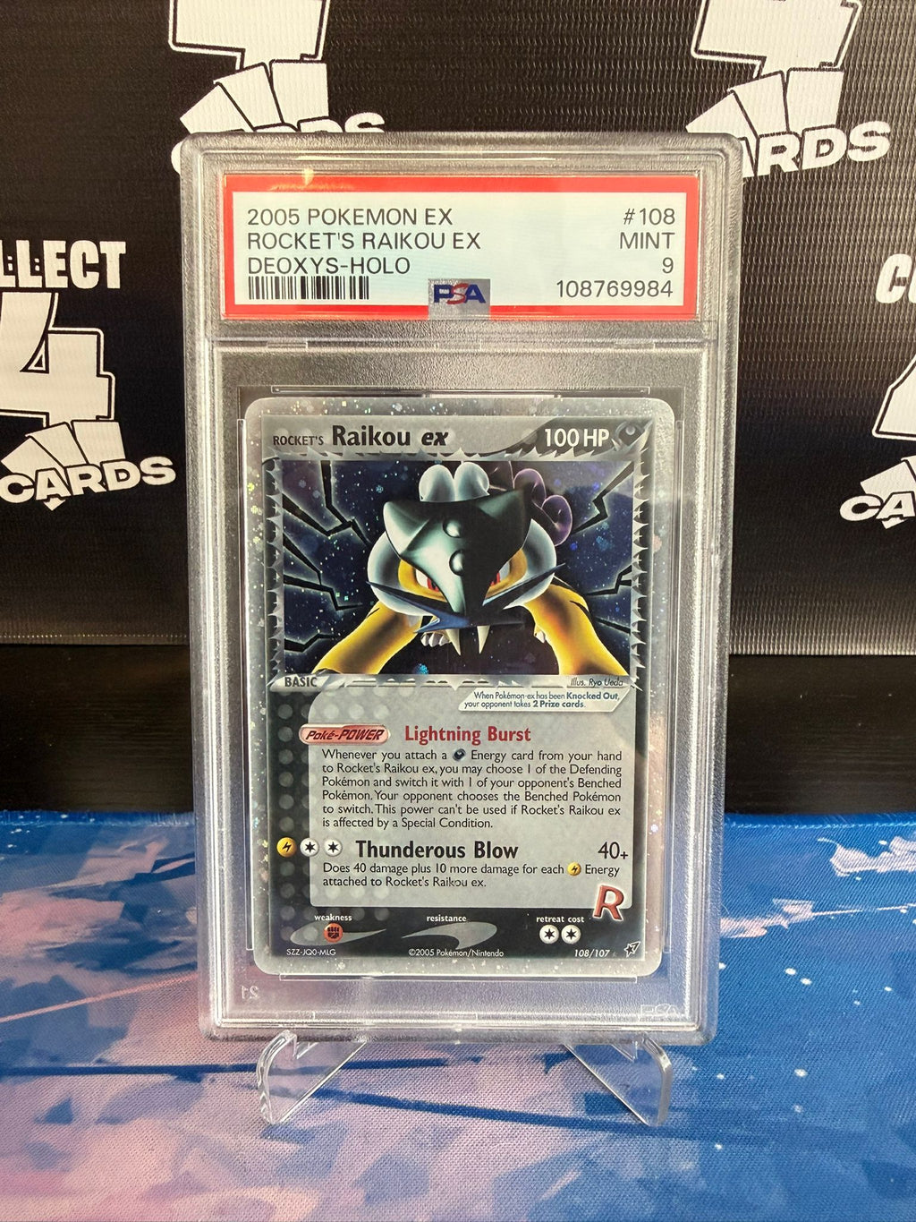 PSA 9 - ROCKET'S RAIKOU EX 108 (2005 Pokémon EX)